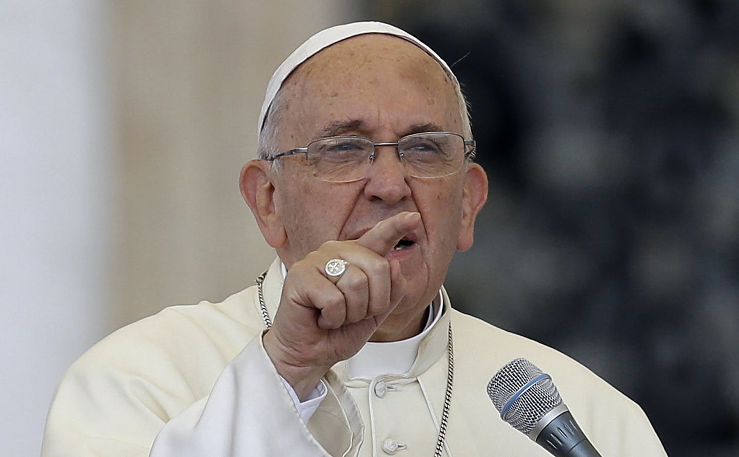 Pope Francis delivers his message on the occasion of an audience with participants of Rome's diocese convention in St. Peter's Square, at the Vatican, Sunday, June 14, 2015. Francis engaged in some self-promotion during his weekly blessing, alerting the thousands of people in St. Peter's Square that his first solo encyclical is coming out on Thursday and inviting them to pay attention to environmental degradation around them. (AP Photo/Gregorio Borgia) ORG XMIT: MIN2015061711312425