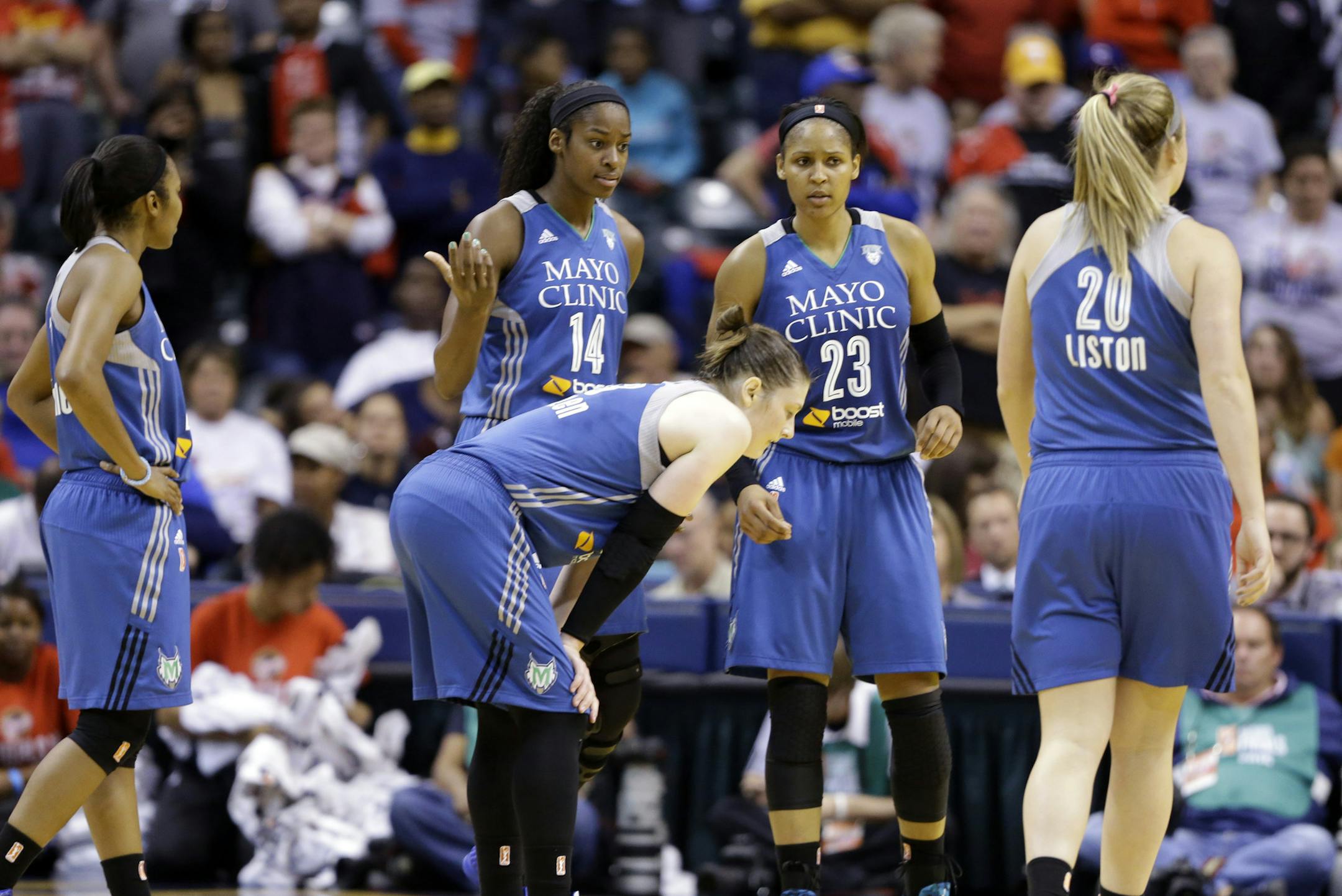 Members of Minnesota Lynx pause in the second half of Game 4 of the WNBA Finals basketball series against the Indiana Fever, in Indianapolis, Sunday, Oct. 11, 2015. The Fever defeated the Lynx 75-69 to even the series.(AP Photo/Michael Conroy)