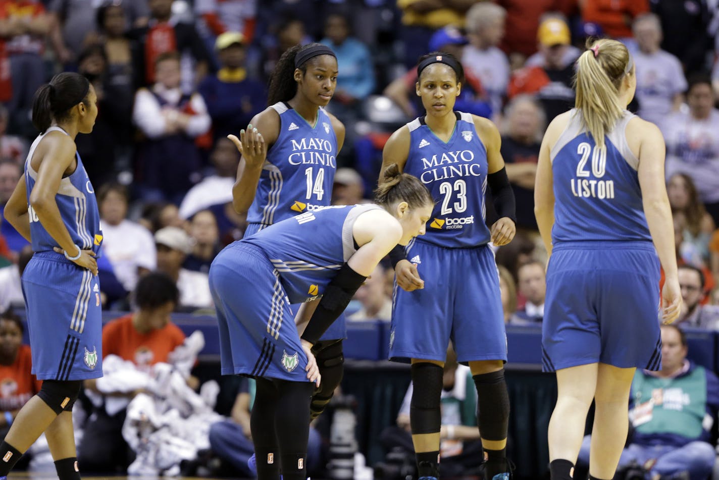 Members of Minnesota Lynx pause in the second half of Game 4 of the WNBA Finals basketball series against the Indiana Fever, in Indianapolis, Sunday, Oct. 11, 2015. The Fever defeated the Lynx 75-69 to even the series.(AP Photo/Michael Conroy)