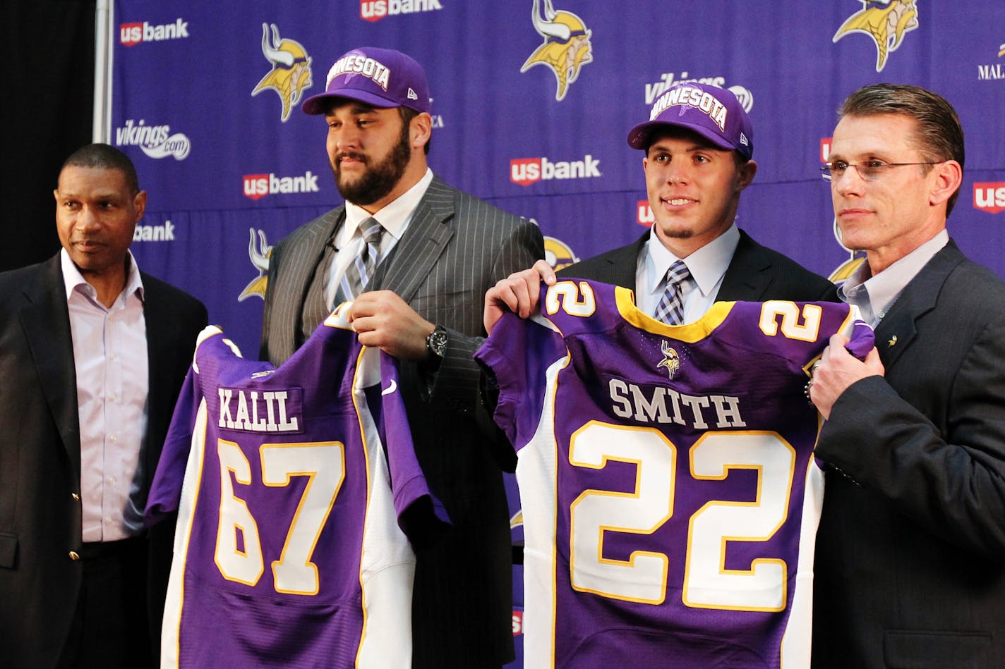 Minnesota Vikings first round draft picks Matt Kalil, second from left, and Harrison Smith are introduced by head coach Leslie Frazier, left, and general manager Rick Spielman