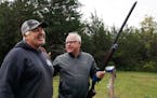 Then-gubernatorial candidate Tim Walz talked with owner Randy Voss as he shot on the sporting clay course Tuesday, Sept. 25, 2018 at the Caribou Gun C