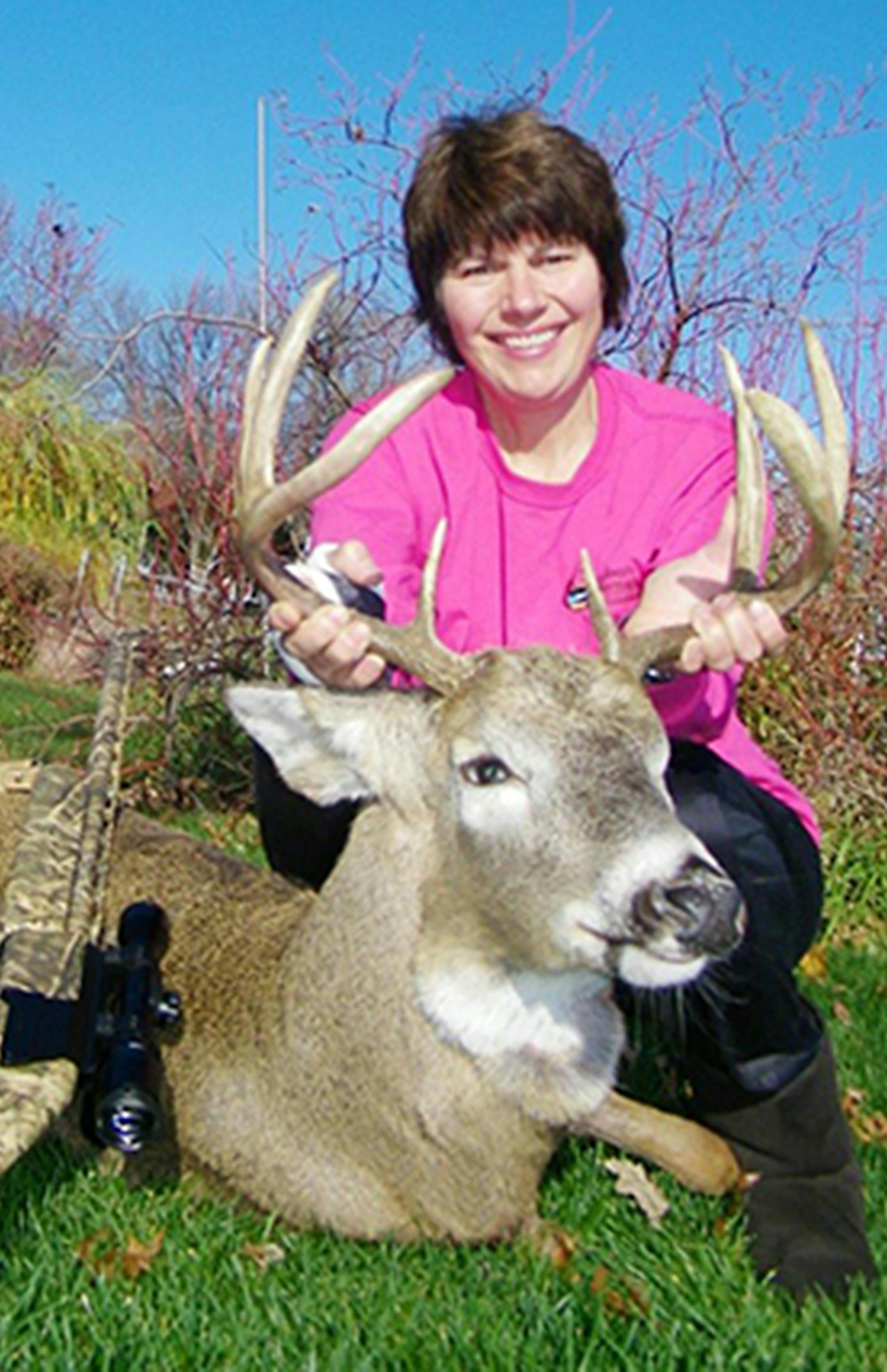 Jane Heinks, 52, of New Brighton, tore tendens in an arm helping disabled hunters earlier this fall. With a special cast, whe was still able to hunt deer last weekend on the opener, taking this dandy buck.