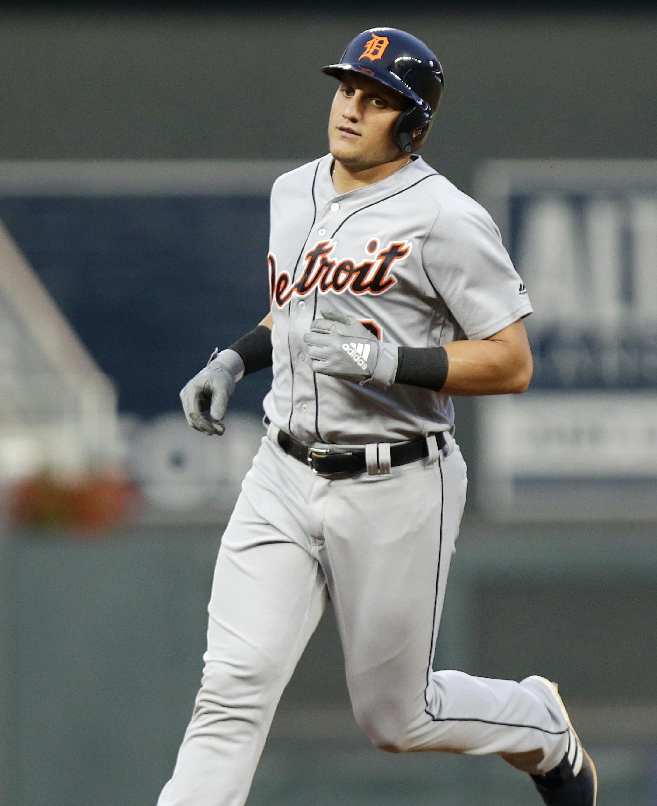 Detroit Tigers' Mike Mahtook (8) runs the bases after hitting a three-run home run against the Minnesota Twins in the fifth inning during a baseball game Saturday, Aug. 18, 2018, in Minneapolis. (AP Photo/Andy Clayton-King)