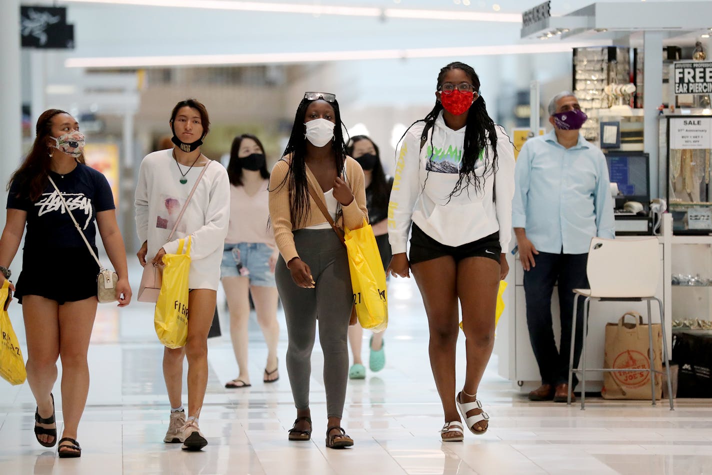 The MOA opened again for the first time since mid-March, where most shoppers wore face masks Wednesday, June 10, 2020, in Bloomington, MN.] DAVID JOLES • david.joles@startribune.com Many small businesses such as fitness centers, bowling alleys and movie theaters are being allowed to open Wednesday with limited capacity as Minnesota begins to loosen gathering restrictions due to COVID-19. On the other end of the spectrum, Mall of America also reopens Wednesday for the first time since the pandemi