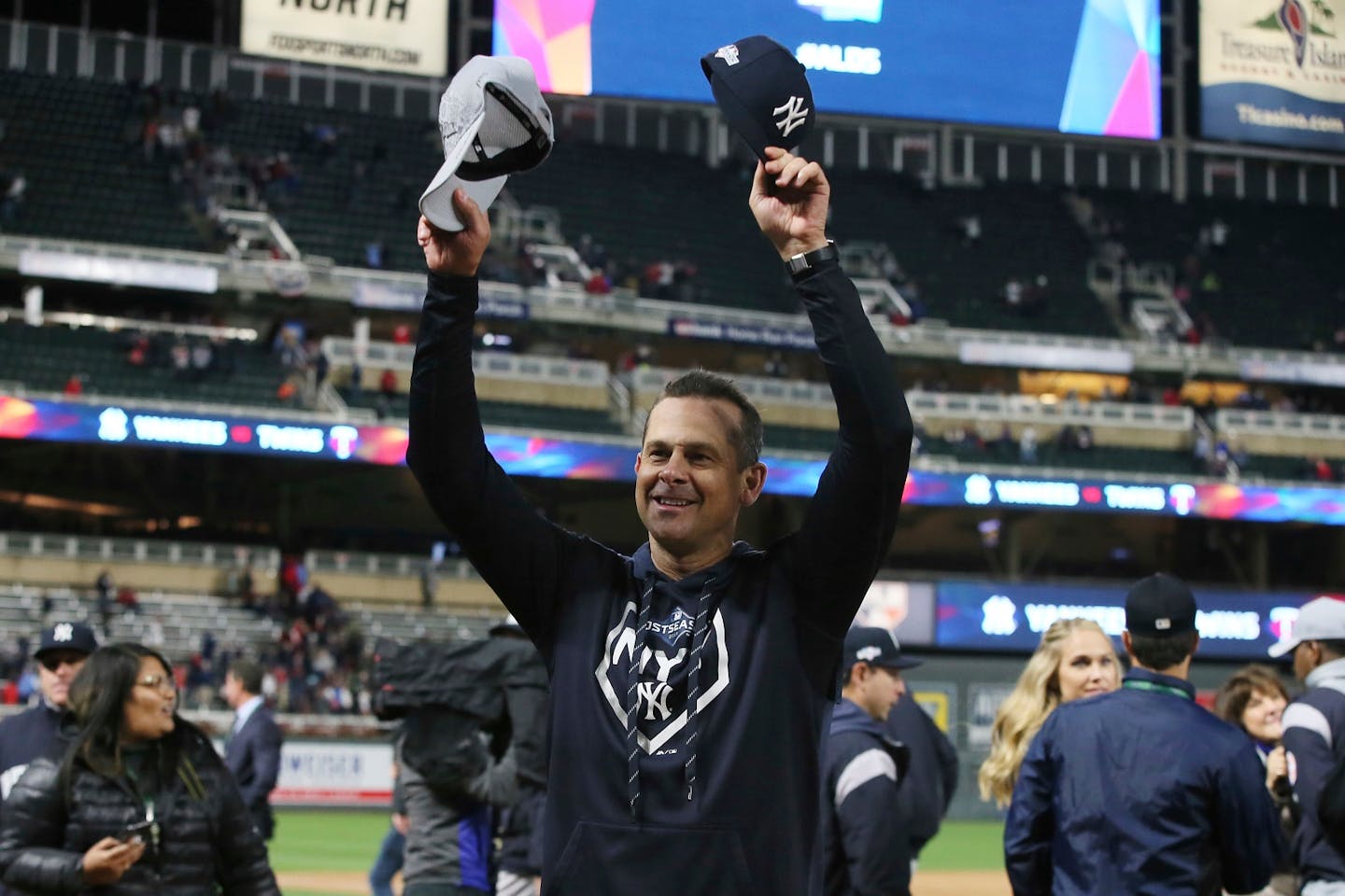 New York Yankees manager Aaron Boone celebrates after his team's 5-1 victory over the Minnesota Twins in Game 3 of a baseball American League Division Series, Monday, Oct. 7, 2019, in Minneapolis. (AP Photo/Jim Mone)