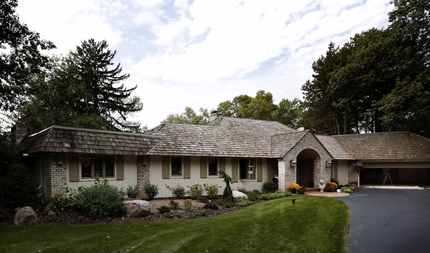 Exterior photo of home coming up for sale in Tonka Bay, MN. ] CARLOS GONZALEZ cgonzalez@startribune.com - September 13, 2016, Tonka Bay, MN, The housing market in the Twin Cities is beginning its annual seasonal slow-down, according to an August sales report. Mary Beattie is a real estate agent who will be at a staging appointment for a house that's going on the market soon.