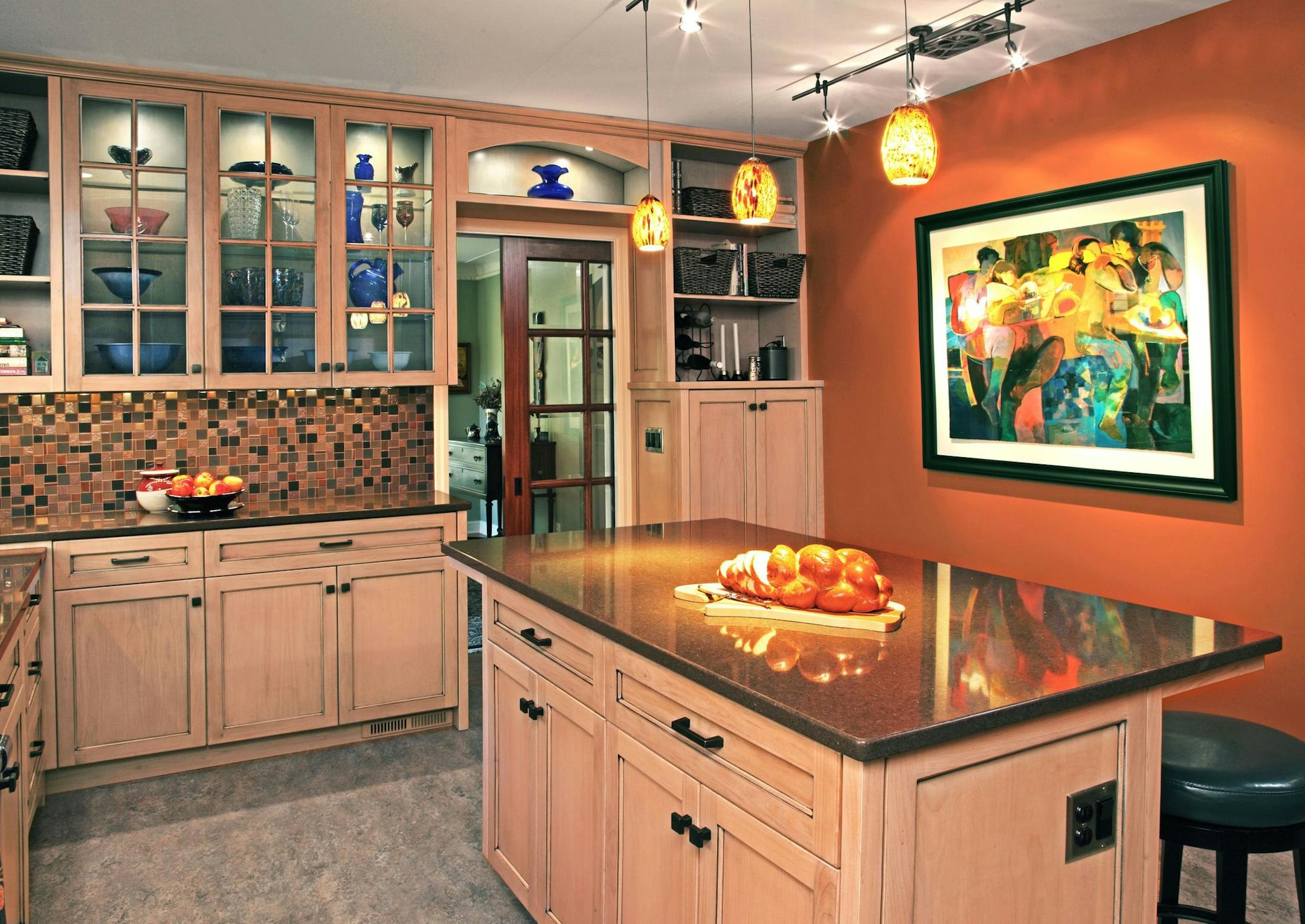 The new kitchen, above, complements the home’s traditional character.