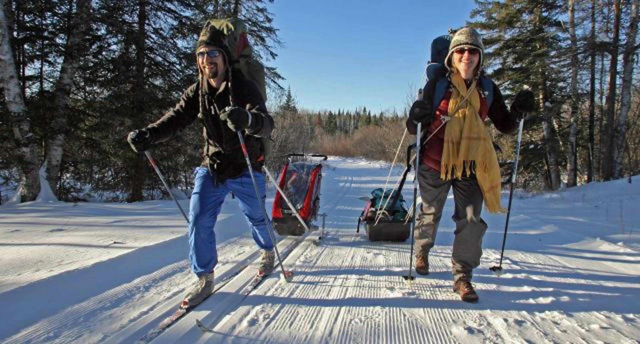 Dan Klein, left and his wife Sarah Kline cross country skied into Tettagouche State Park along the north shore. Dan pulled their two children Cecelia and Henry in the sled behind while Sarah pulled a sled of supplies to be used while renting a remote cabin in the park.
