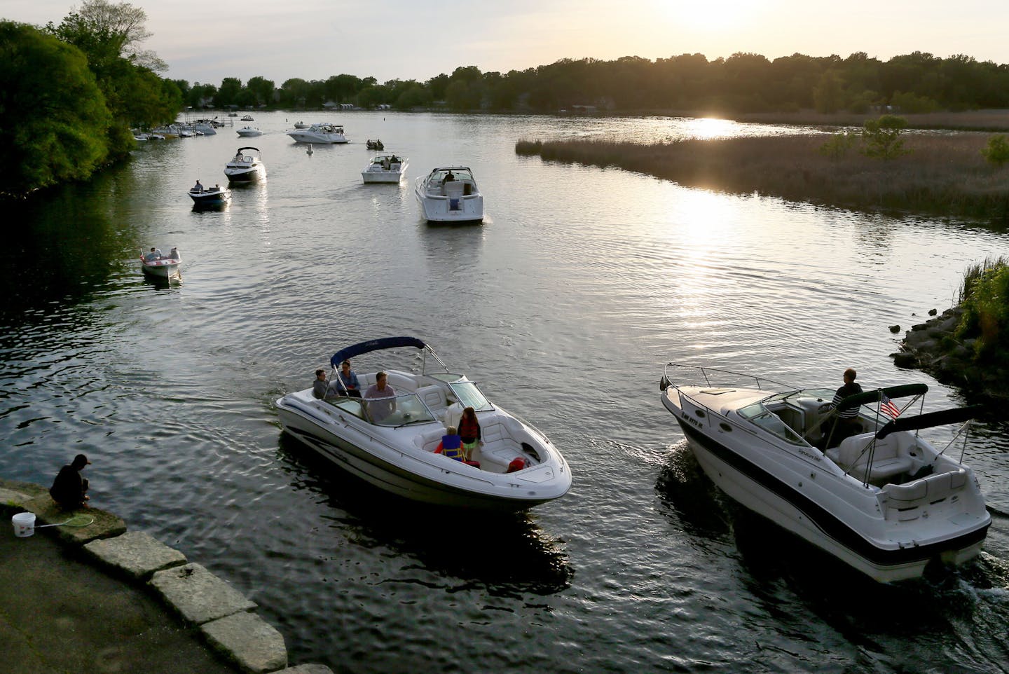 Boat traffic was heavy on Lake Minnetonka as daylight faded Friday, May 22, 2015, near Lord Fletcher's in Spring Park, MN.](DAVID JOLES/STARTRIBUNE)djoles@startribune.com As boaters flock to Minnesota lakes and rivers this holiday weekend for the unofficial kick-off to the boating season, they'll face more inspections in and out of the water as local cities and counties ramp up their work to stop the spread of invasive species. Across the metro, more boat accesses will be staffed by watercraft i