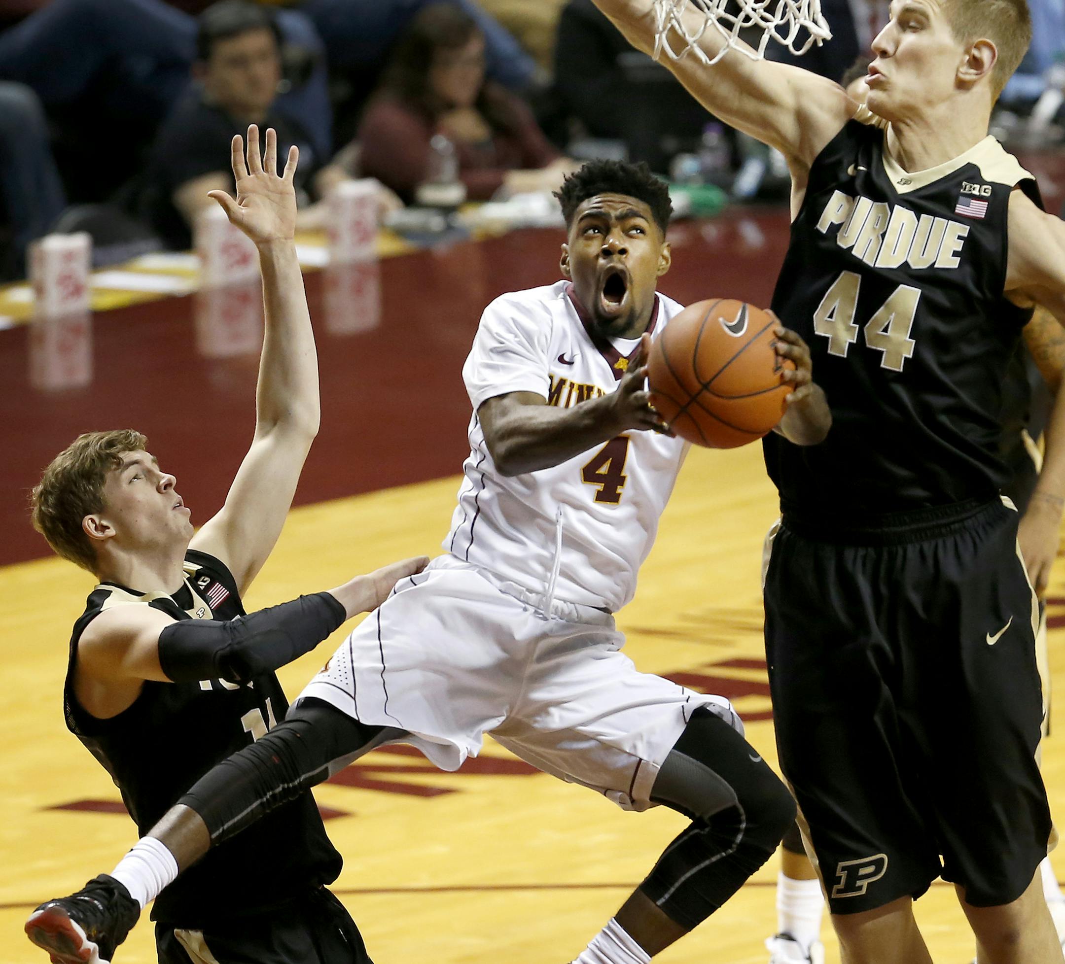 Kevin Dorsey Jr. (4) was fouled by Isaac Haas (44) in the first half. ] CARLOS GONZALEZ cgonzalez@startribune.com - January 27, 2016, Minneapolis, MN, Williams Arena, NCAA Basketball, University of Minnesota Gophers vs. Purdue Boilermakers