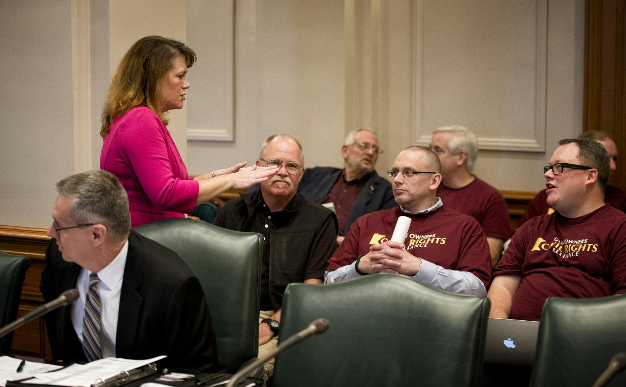 Sen. Michelle Benson talked with gun rights advocates before the start of Wednesday's hearing. An advisory committee on Capitol Security began with two legislators, Rep. Michael Paymar and Sen. Michelle Benson not even knowing if they would be allowed to continue as members of the committee. Wednesday, August 14, 2013 ] GLEN STUBBE * gstubbe@startribune.com