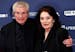 FILE - French director Claude Lelouch, left, and French actress Anouk Aimee pose on the red carpet upon their arrival at the 24th Lumieres Awards cere