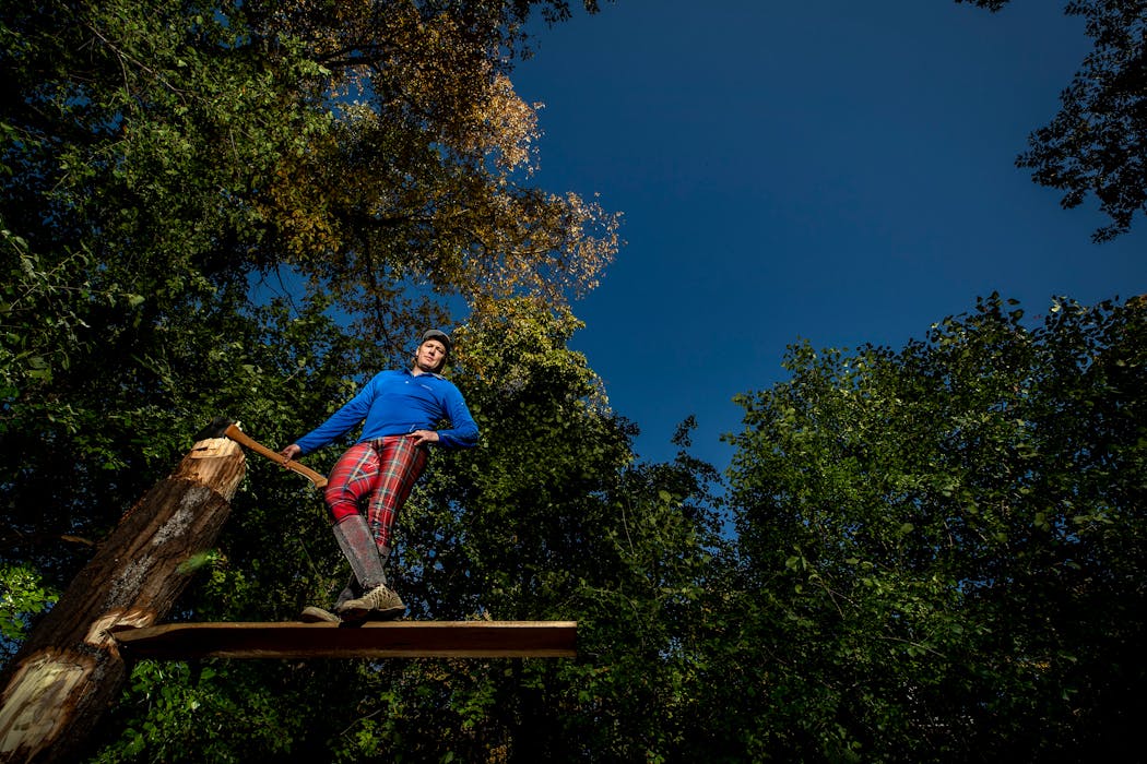 Cassidy Scheer has customized a lumberjack workout area in his backyard.