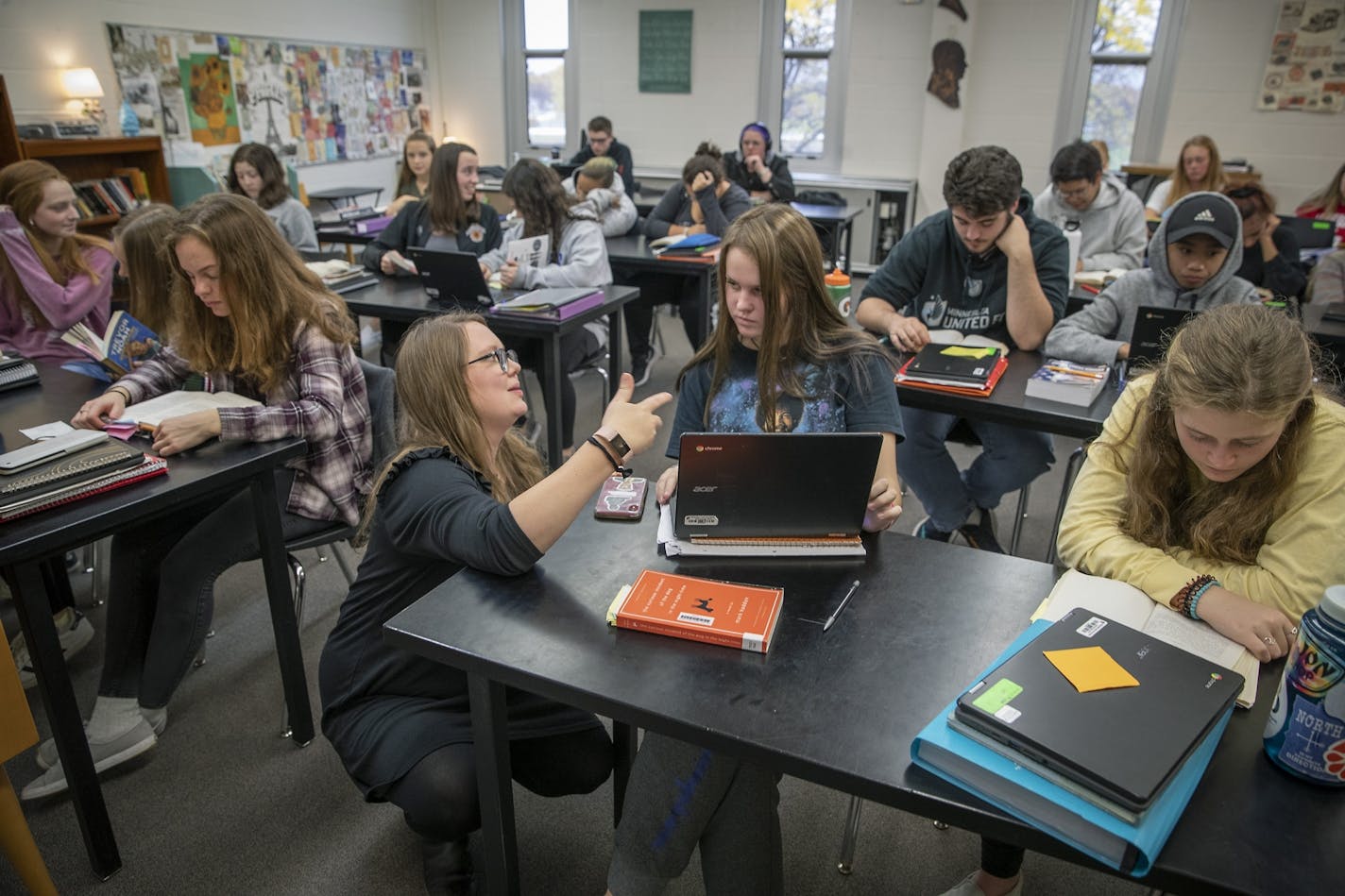 In White Bear Lake, district officials expect a surge of 2,000 more students over the next decade. Above, Katelin Held worked with her language arts students at White Bear Lake North.