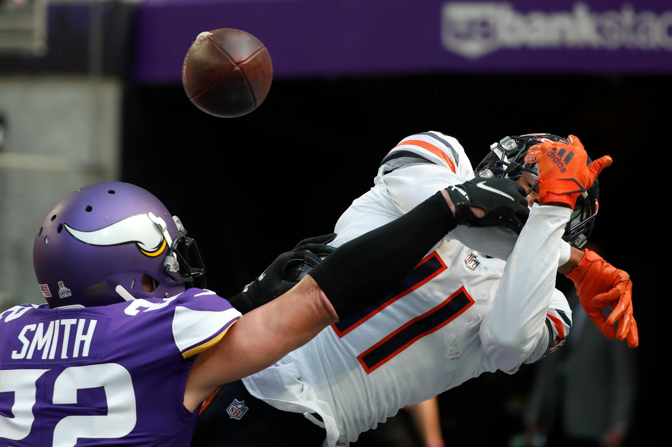 Minnesota Vikings safety Harrison Smith (22) breaks up a pass intended for Chicago Bears wide receiver Darnell Mooney (11) during the second half of an NFL football game, Sunday, Oct. 9, 2022, in Minneapolis. (AP Photo/Bruce Kluckhohn)