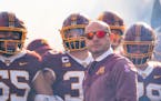 Minnesota Gophers players wait with head coach P.J. Fleck to run out of the tunnel before their game against the Purdue Boilermakers Saturday, Oct. 1,