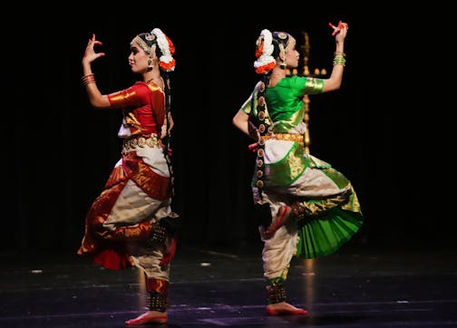 Alisha, left and Isha Shah present Bharatanatyam Arangetram, Saturday, July 30, 2022 in Bloomington, Minn.