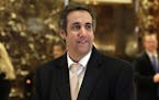 FILE - In this Dec. 16, 2016, file photo, Michael Cohen, an attorney for Donald Trump, arrives in Trump Tower in New York. Stormy Daniels, the porn st