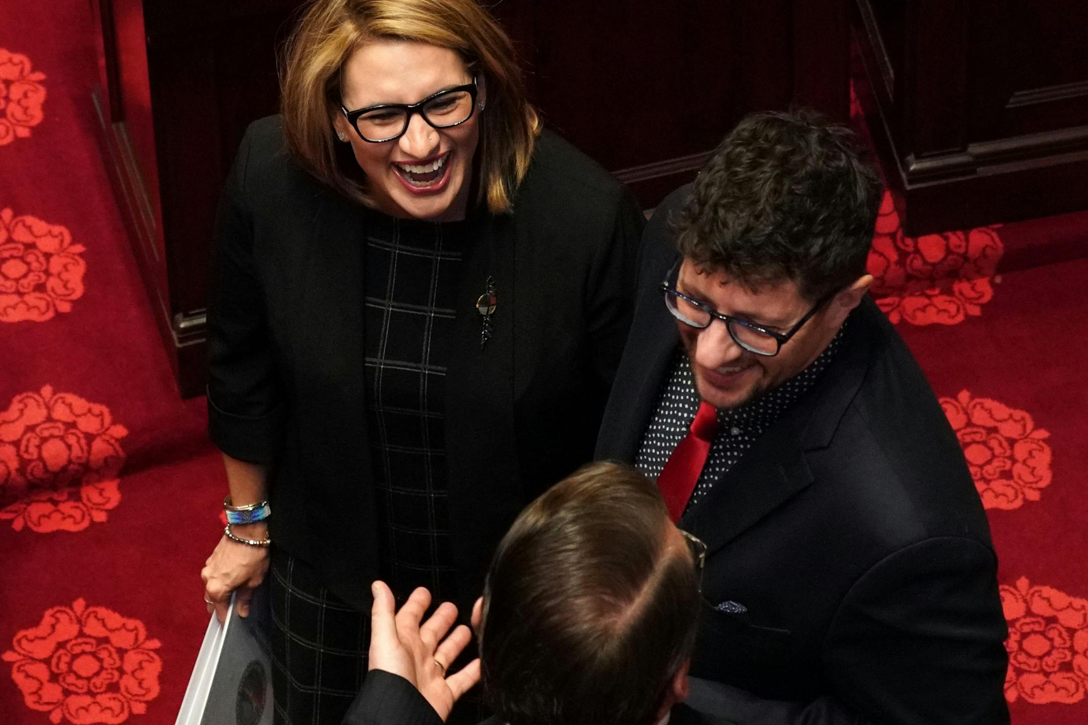 Lt. Gov. Peggy Flanagan and her partner Tom Weber arrived at the Senate Chamber for the first day of the legislative session.
