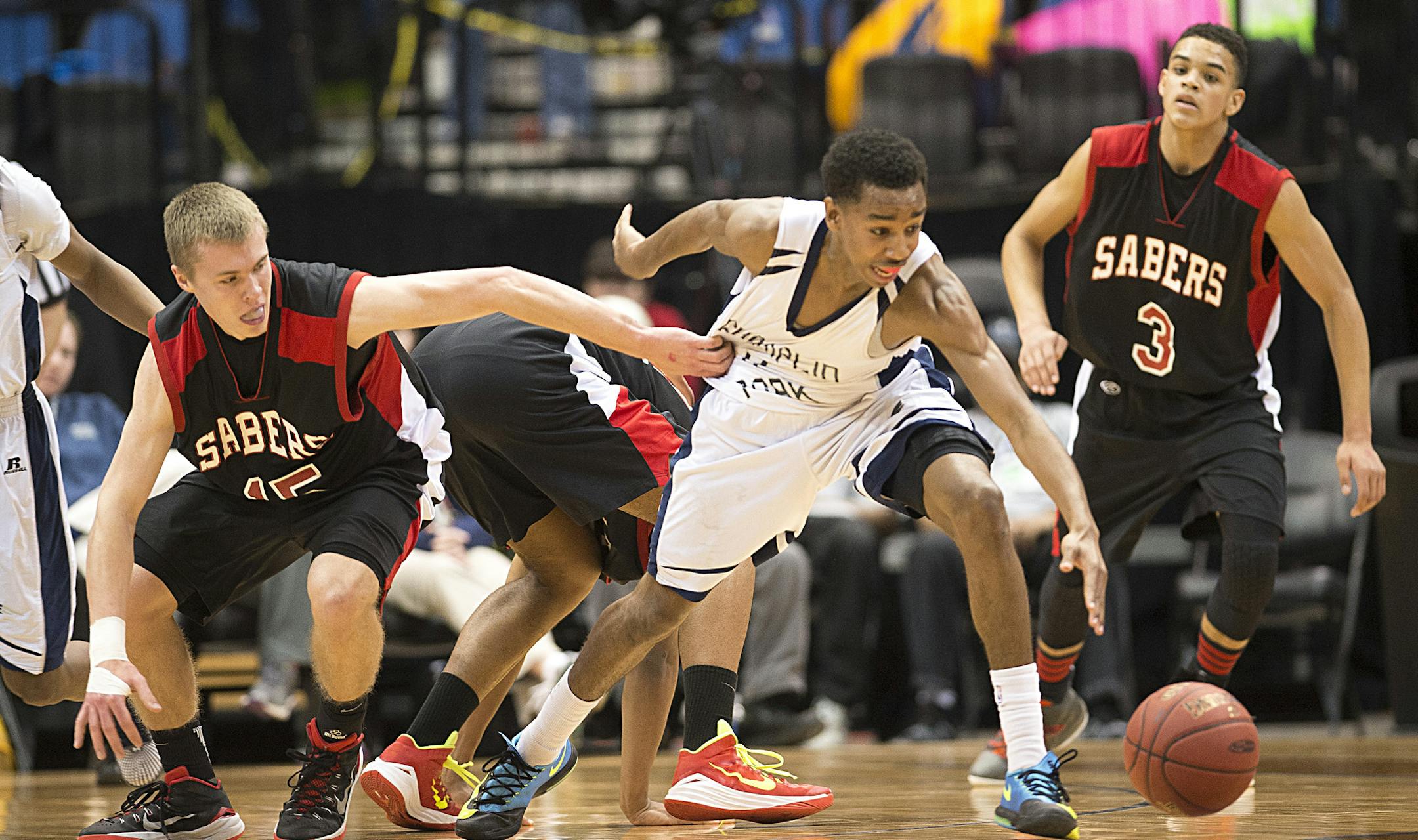 Shakopee guard Evan Hagen (15) grabs the jersey of Champlin Park guard Jeremy Johnson (4) as Johnson lunges forward for a loose ball in the first half. ] (Aaron Lavinsky | StarTribune) Shakopee plays Champlin Park in the boys' basketball Class 4A semifinals on Thursday, March 12, 2015 at Target Center