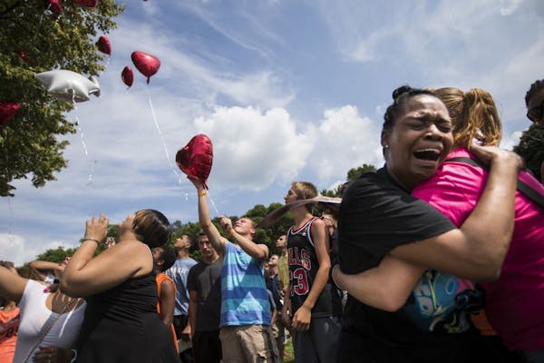Kimberly Adama, Sha-kim's mother, wept as a group of family and friends released balloons in the air in his memory during a memorial on Thursday, Augu