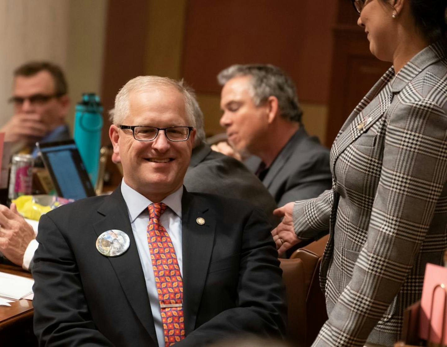 Rep. Jim Nash, R-Waconia, wore a specially made button calling for the introduction of wolves into Fort Snelling, a light hearted amendment designed to draw attention to the actual threat posed by wolves in more rural parts of Minnesota. His amendment was not serious but was designed to make a serious point.