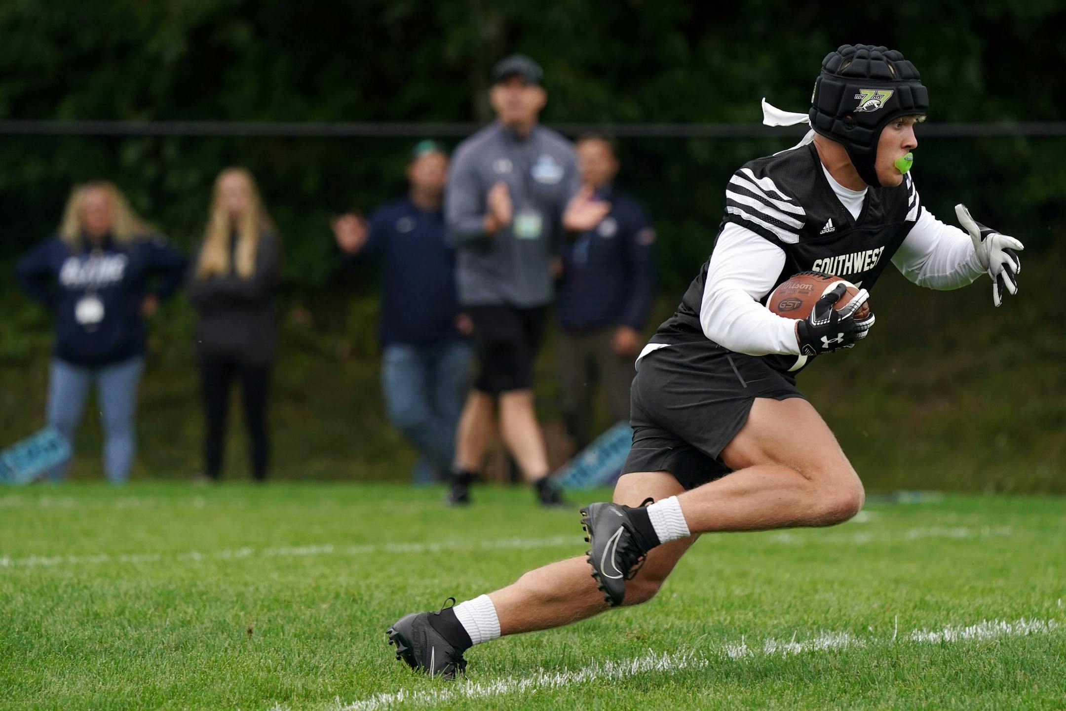 Minneapolis Southwest player Nick Flaskamp ran the ball during a seven-on-seven game against Champlin Park Saturday. ] ANTHONY SOUFFLE • anthony.souffle@startribune.com Local area high school football players competed in a seven-on-seven tournament Saturday, Sept. 12, 2020 at the Life Time Sport Winter Park in Eden Prairie, Minn.