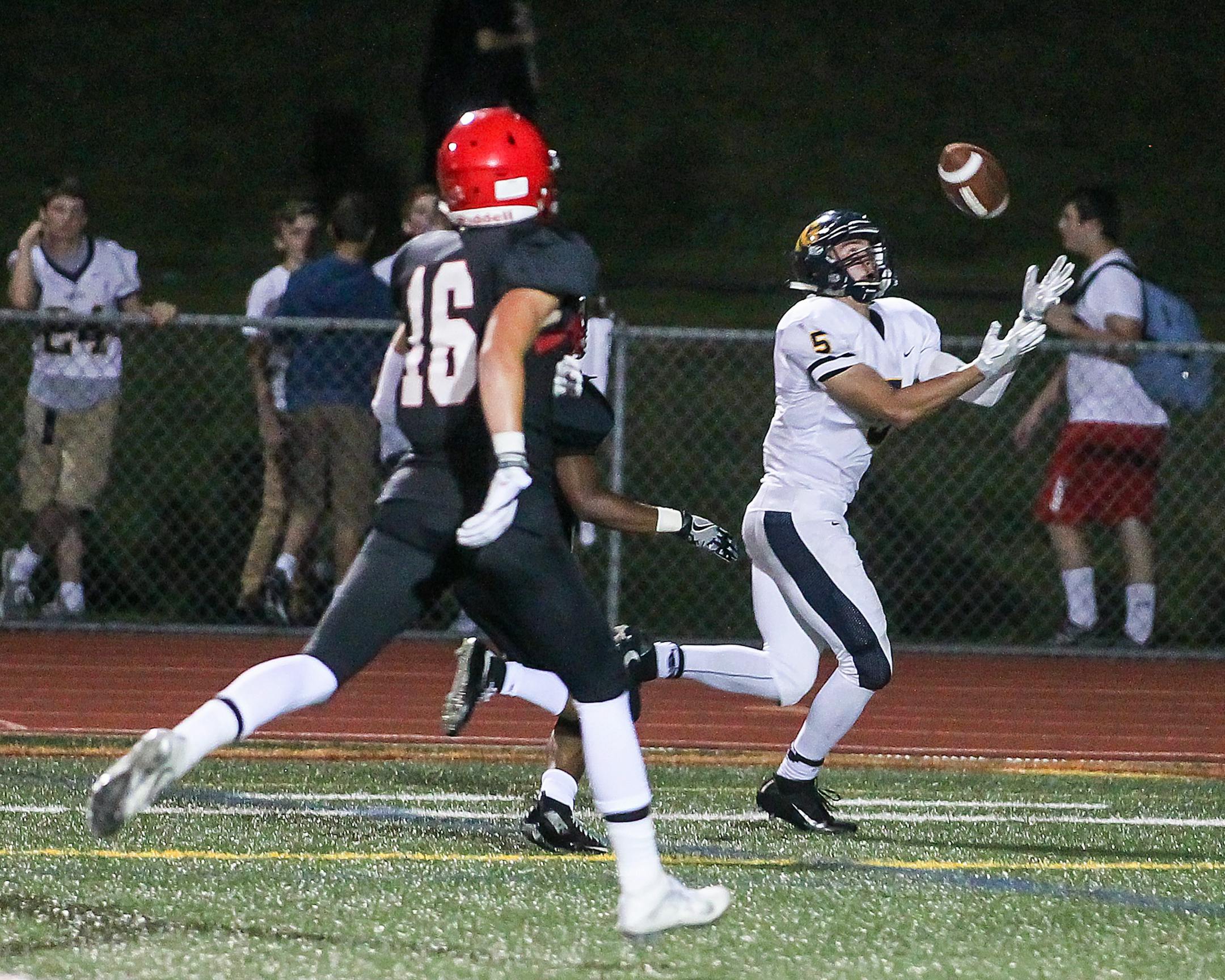 Ivan Burlak's 22-yard reception on fourth-and-3 with six minutes to play in the fourth quarter gave Totino Grace a 17-14 lead at Eden Prairie. Totino Grace held on to win at Eden Prairie Thursday night.