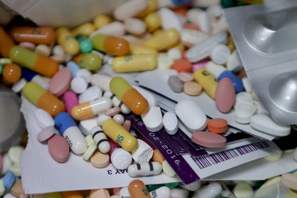 FILE&#x2014;This file photo from Sept. 11, 2019 shows medications in a locked storage area that are slated for destruction at the police headquarters 