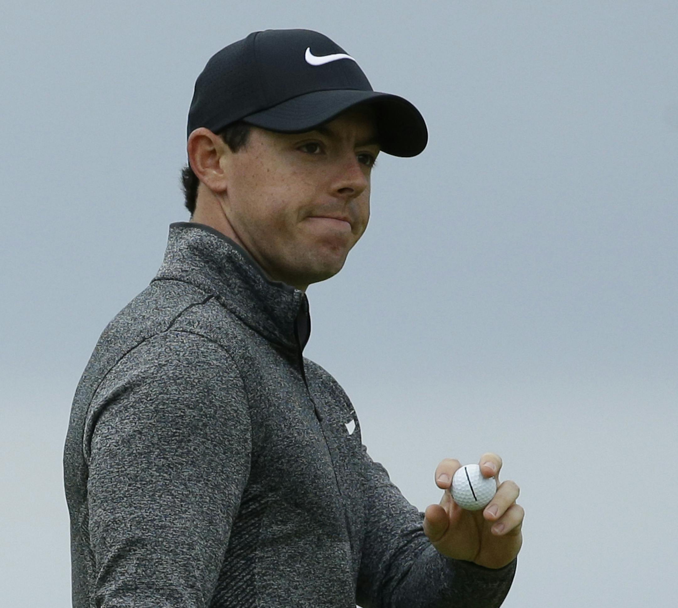 Rory McIlroy of Northern Ireland acknowledges the crowd after putting on the 2nd green during the final round of the British Open Golf Championship at the Royal Troon Golf Club in Troon, Scotland, Sunday, July 17, 2016. (AP Photo/Matt Dunham)