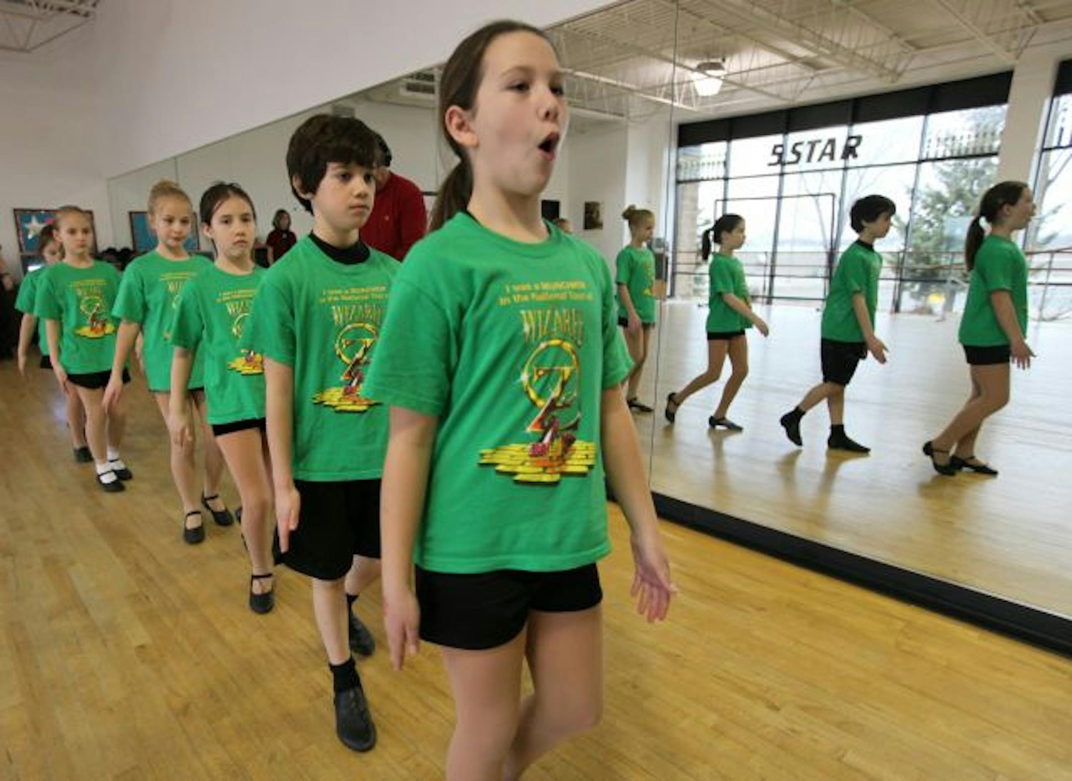 The Kids from Five Star Dance Studio, Woodbury worked on their Munchkin moves that they will perform in the" Wizard of OZ." From the front of the line: Marina Tipler, David Blong, Sierra Klein, Olivia Tolkinen, Jessica Hoveland.