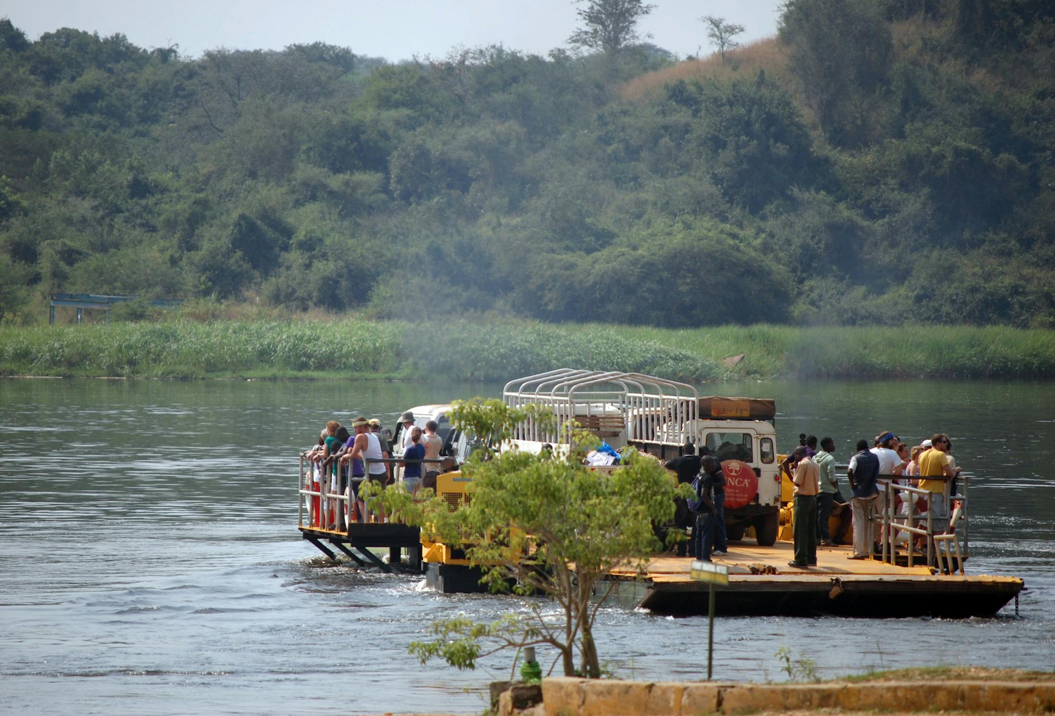 ugandaTR032413 2. A ferry shuttles people and cars across the Nile every two hours to the Paraa Safari Lodge at Uganda's Murchison Falls National Park. (Photo by Curt Brown)