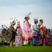 Dancers lined up for the Grand Entrance during the Shakopee Mdewakanton Sioux Community Wacipi Pow Wow on Friday in Shakopee.