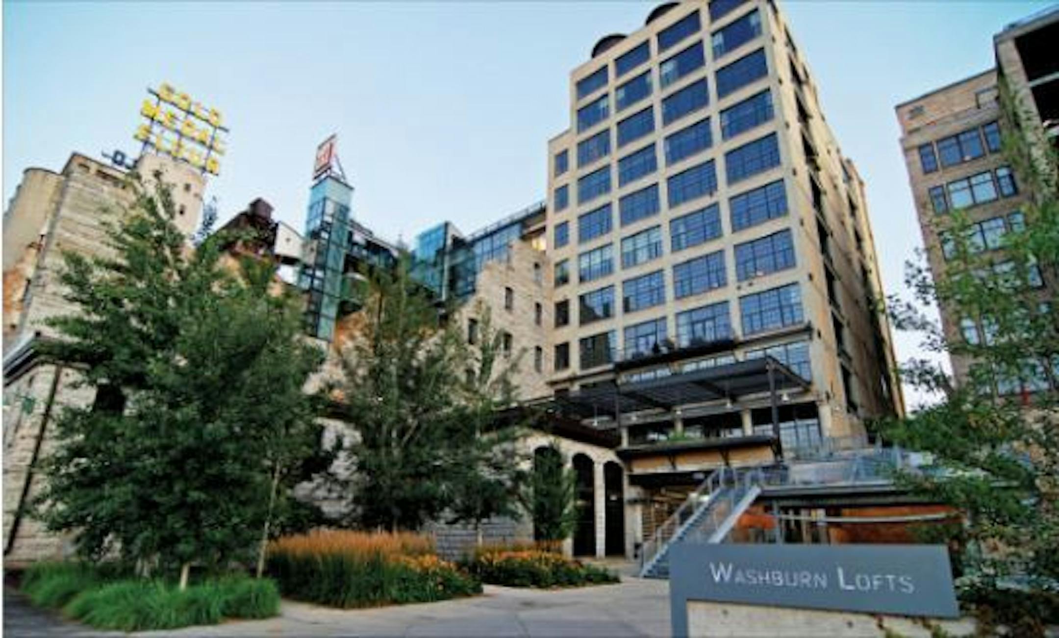 The Washburn unit has a full-on view of the entire length of the Stone Arch Bridge and St. Anthony Falls, a private elevator and its own manicured lawn.