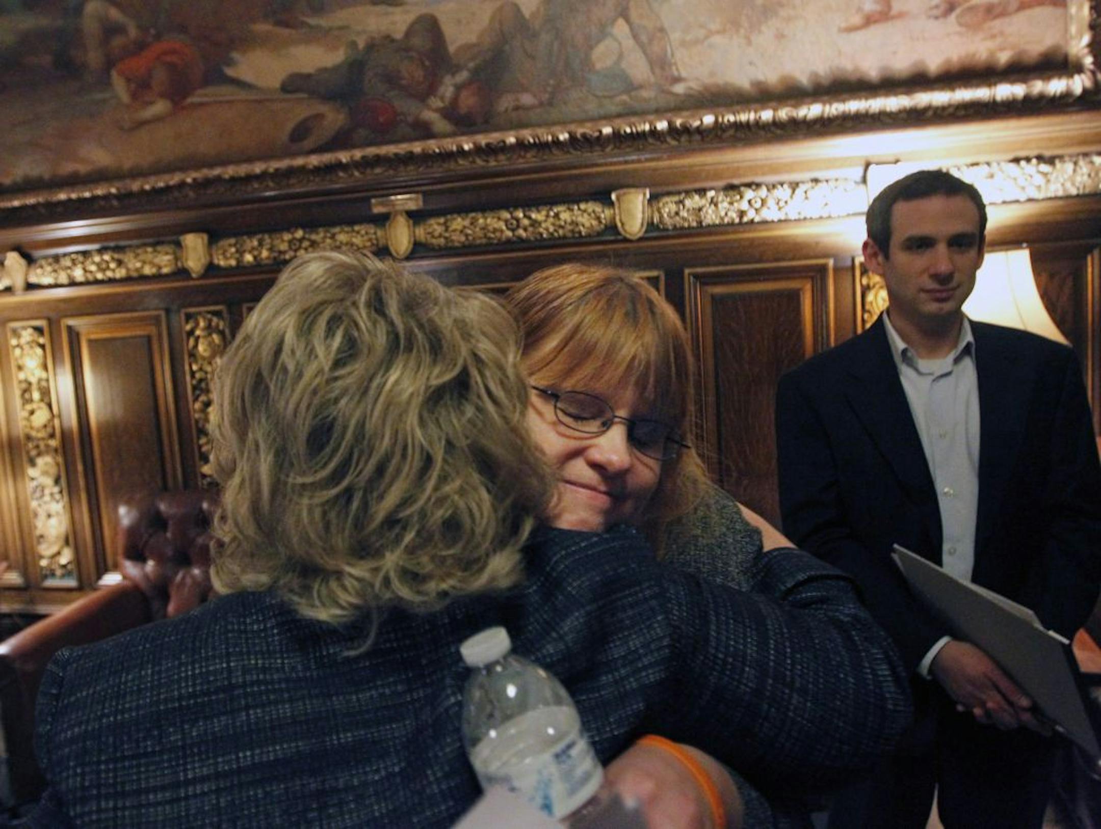At the Governor's Reception Room at the State Capitol in St. Paul, Department of Education Chief of Staff Charlene Briner hugged anti-bullying advocate Tammy Aaberg. Aaberg's gay son, Justin committed suicide after being bullied. "You did a really good job," said Briner of Aaberg after the press conference in which she addressed the pain suffered by her family. Governor Mark Dayton is creating a task force to address the problem.