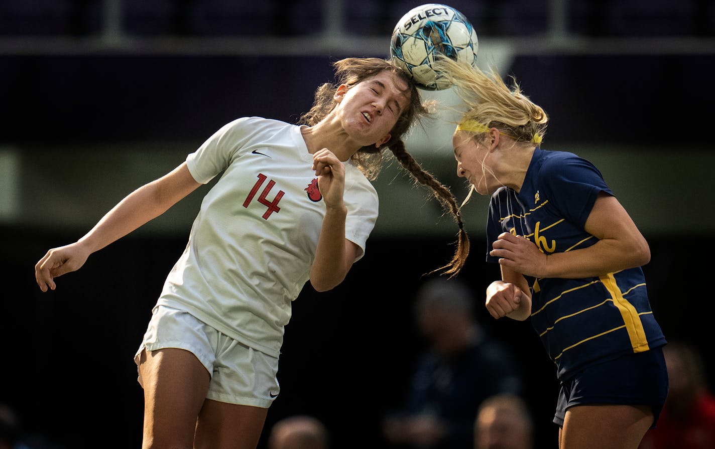 Brooke Nelson. left ,of Stillwater and Skylar Heimerl of Rosemount headed the ball at U.S. Bank Stadium in Minneapolis.,Minn. on Wednesday November 2, 2022.