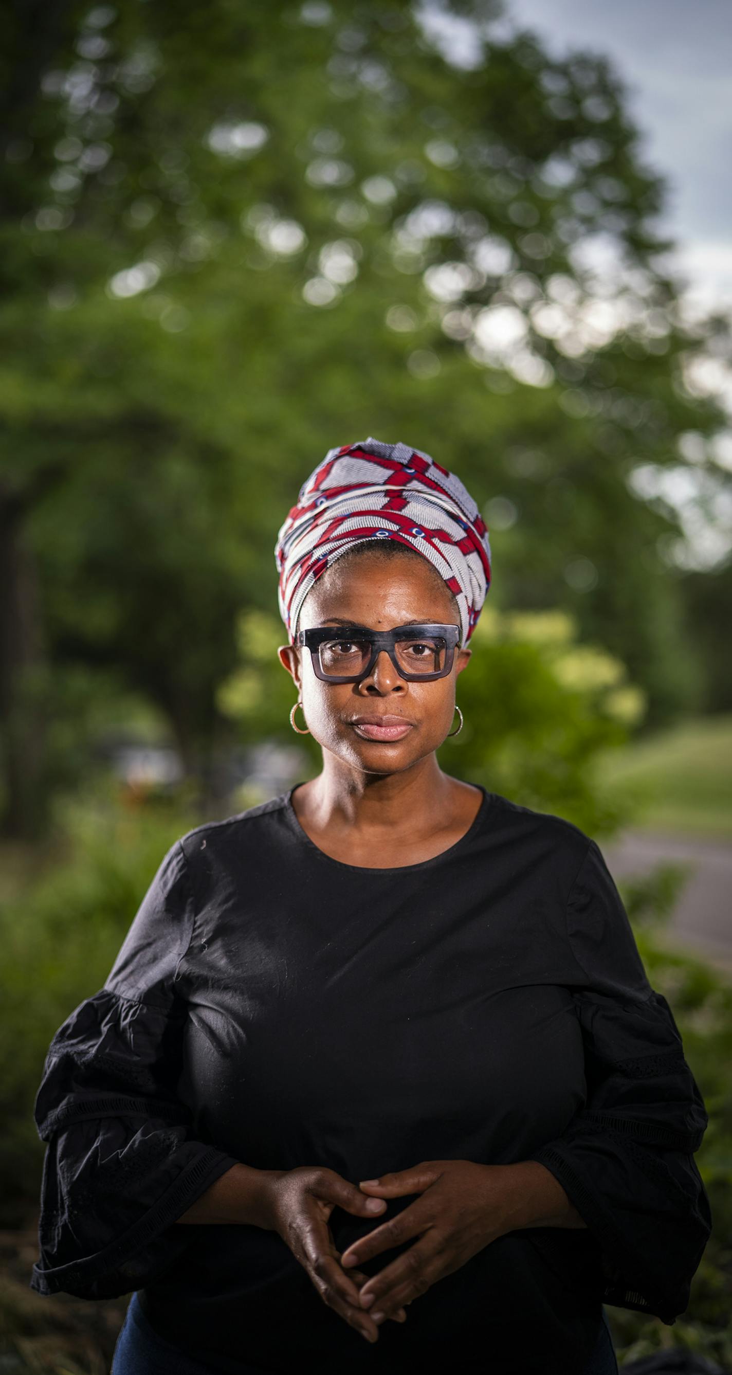 Kimberly Jones posed for a portrait outside her home in Minneapolis. ] LEILA NAVIDI • leila.navidi@startribune.com BACKGROUND INFORMATION: Kimberly Jones posed for a portrait outside her home in Minneapolis on Thursday, July 16, 2020. Nearly 1 in 2 Black Minnesotans have filed for unemployment during the pandemic, compared to 1 in 5 white Minnesotans. One of the reasons is that Black Minnesotans work in many of the hardest-hit sectors such as leisure, hospitality, and health care.