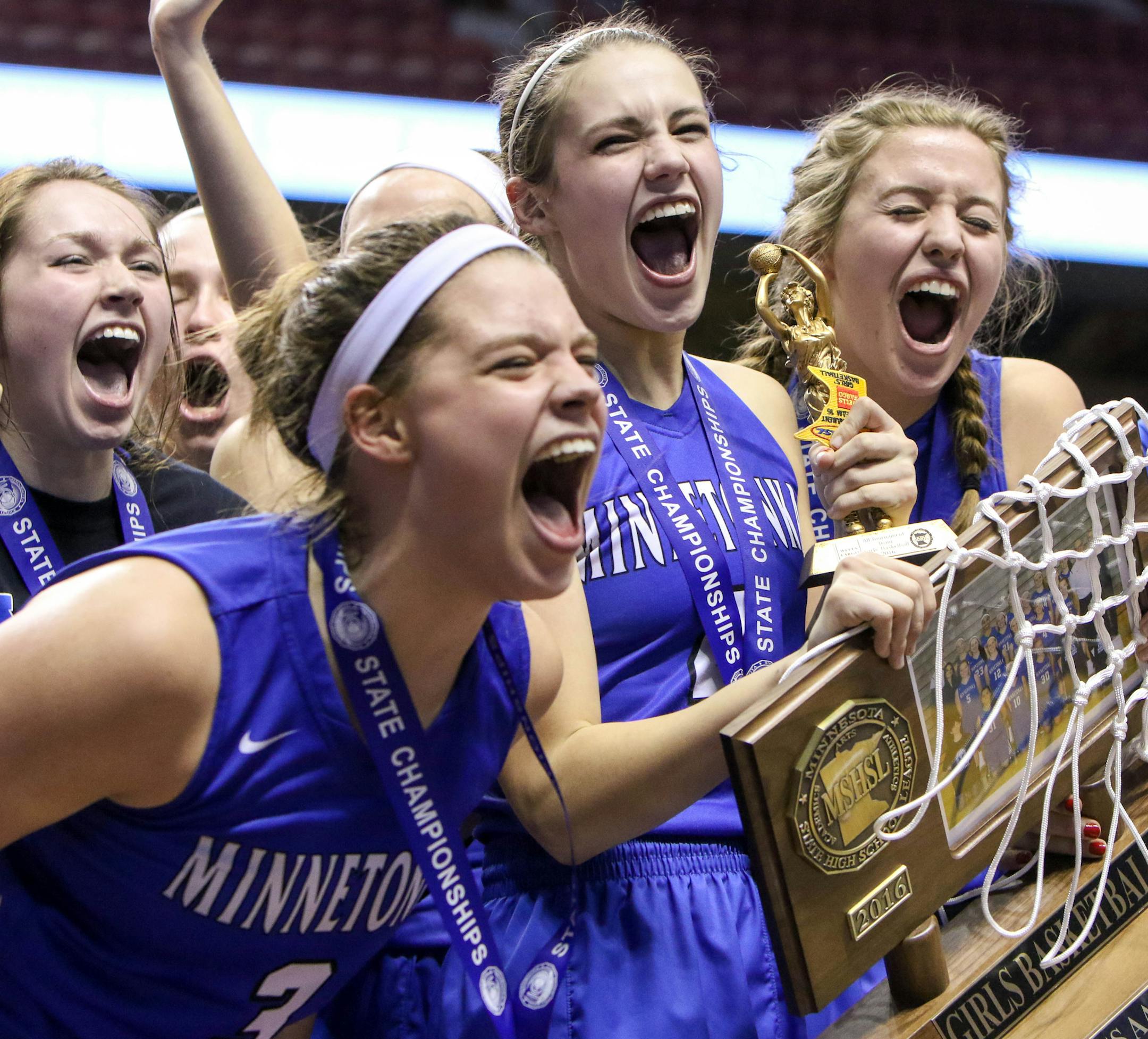 Minnetonka guard Hannah Hedstrom (4) and Minnetonka forward Courtney Fredrickson (24) hold the tournament trophy while celebrating in the Class 4A Finals of the 2016 MSHSL Girls Basketball Tournament on March 19, 2016 at Williams Arena on the campus of University of Minnesota in Minneapolis, Minn. ] Special to Star Tribune, Matt Blewett | matt@mattebphoto.com, Matte B Photography, 2016 MSHSL Girls Basketball Tournament, Minnetonka High School, Hopkins High School, 41655 PREP032016