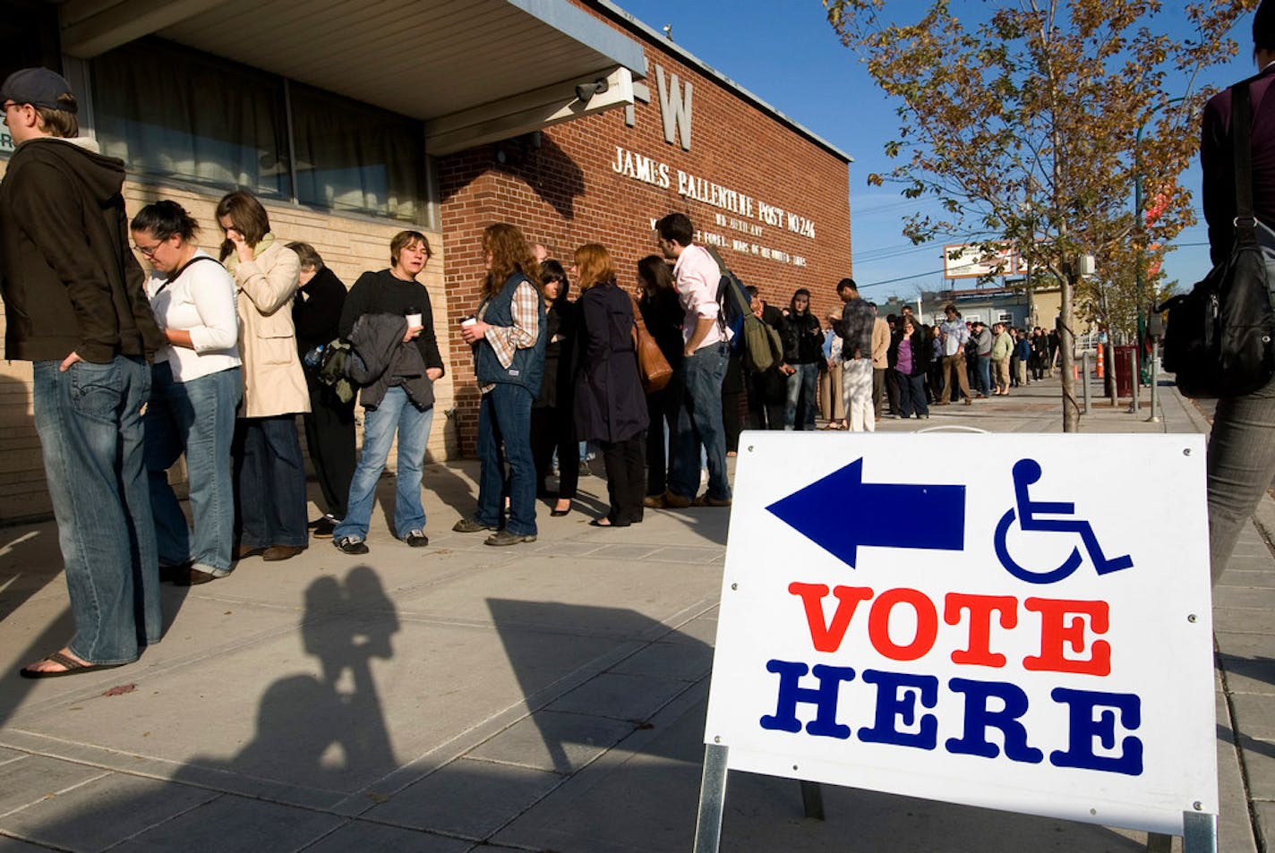 Voters line up to cast their ballot in Minneapolis' Lyn-Lake neighborhood.