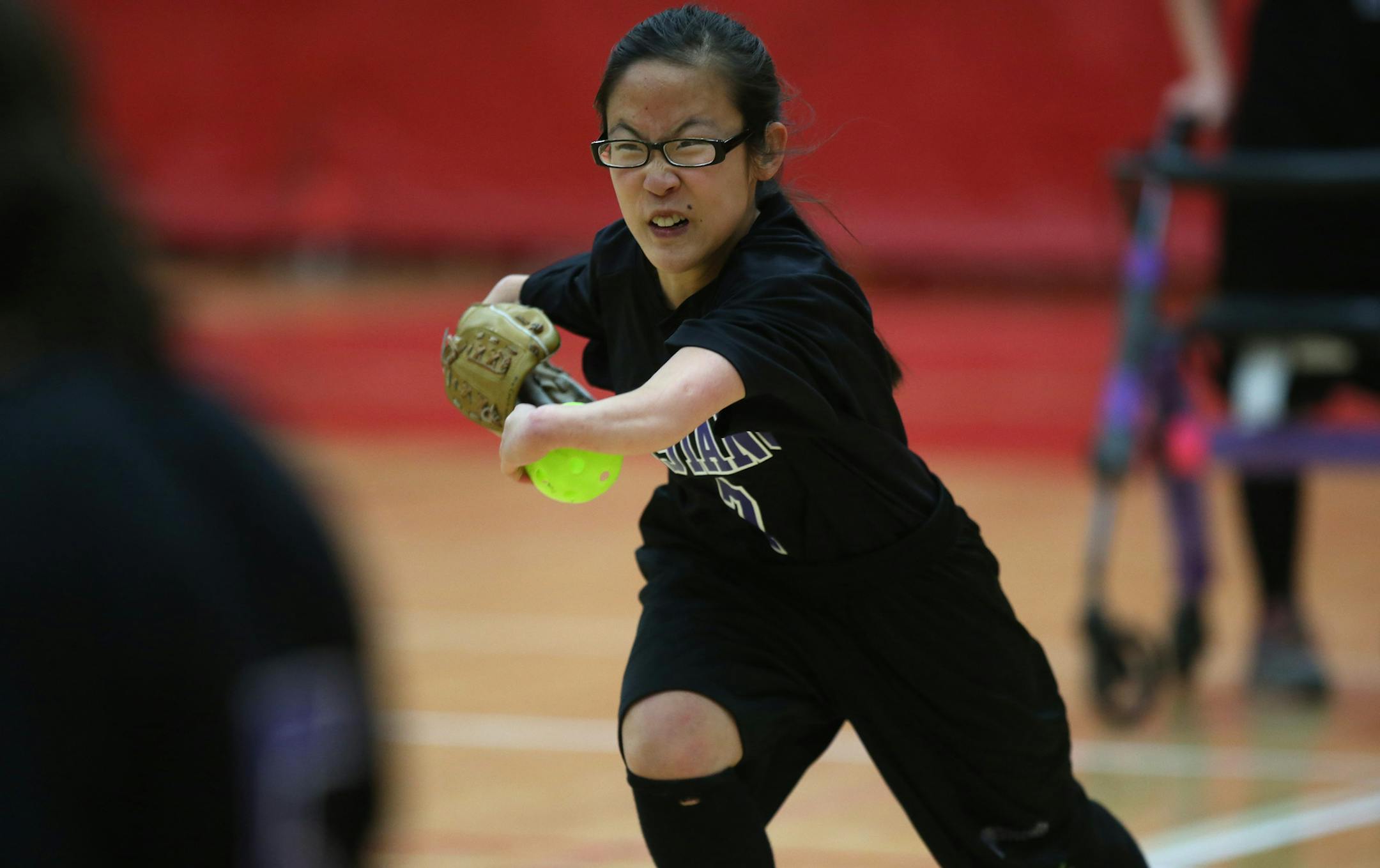 Anoka-Hennepin’s Hana France chased down a runner in the sixth inning as the Mustangs defeated Rochester in the adapted softball championship’s PI division.