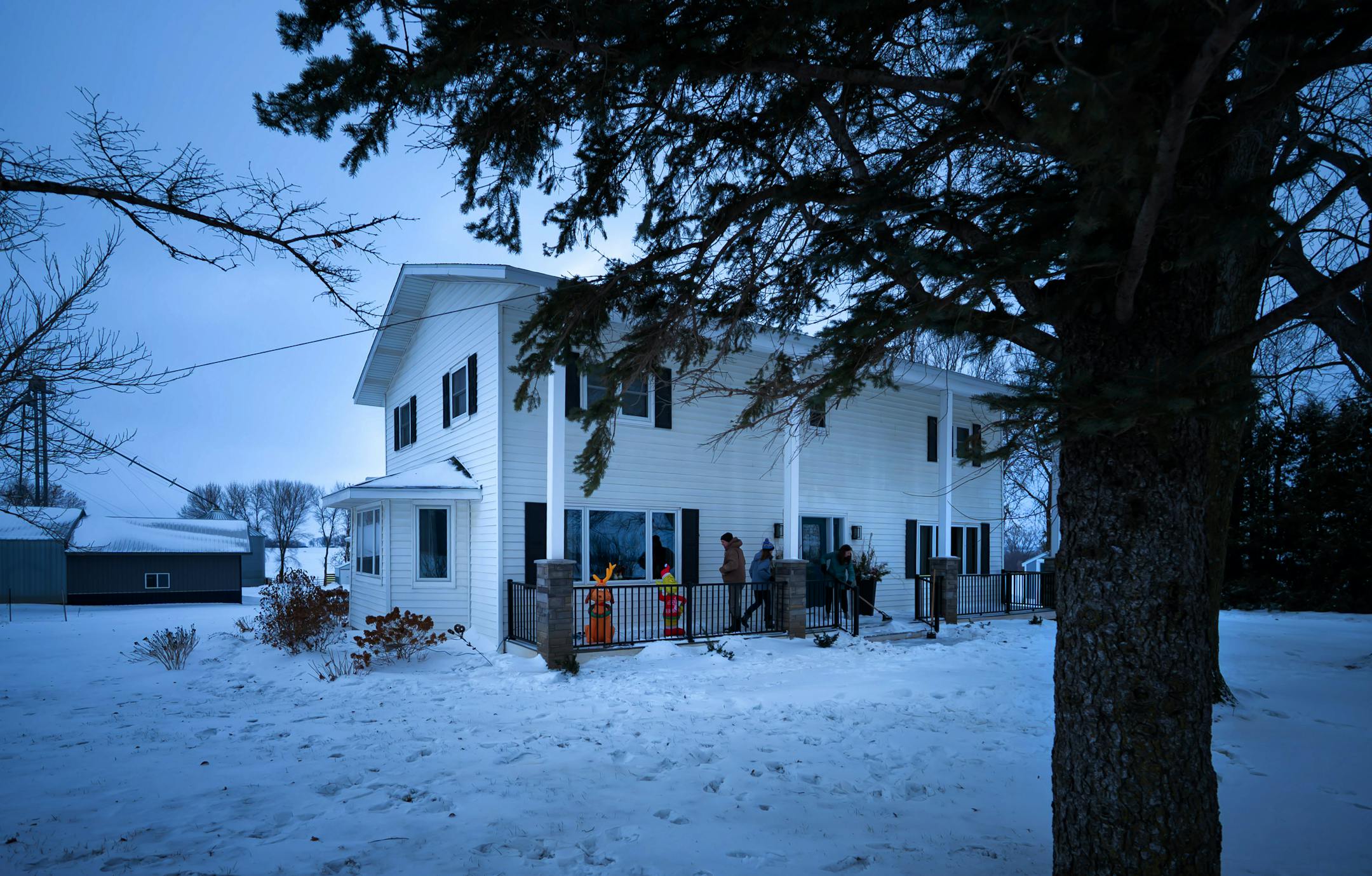 Ben Johnson and his daughter Talia, 14 installed the family’s new Christmas decorations, an inflatible Grinch and his dog Max, that Talia won in a family gift exchange last year, while Ben’s wife Merideth scraped ice from the front of their house.
Kenyon, Minn., Wednesday December 10, 2025 


Glen Stubbe for The Minnesota Star Tribune