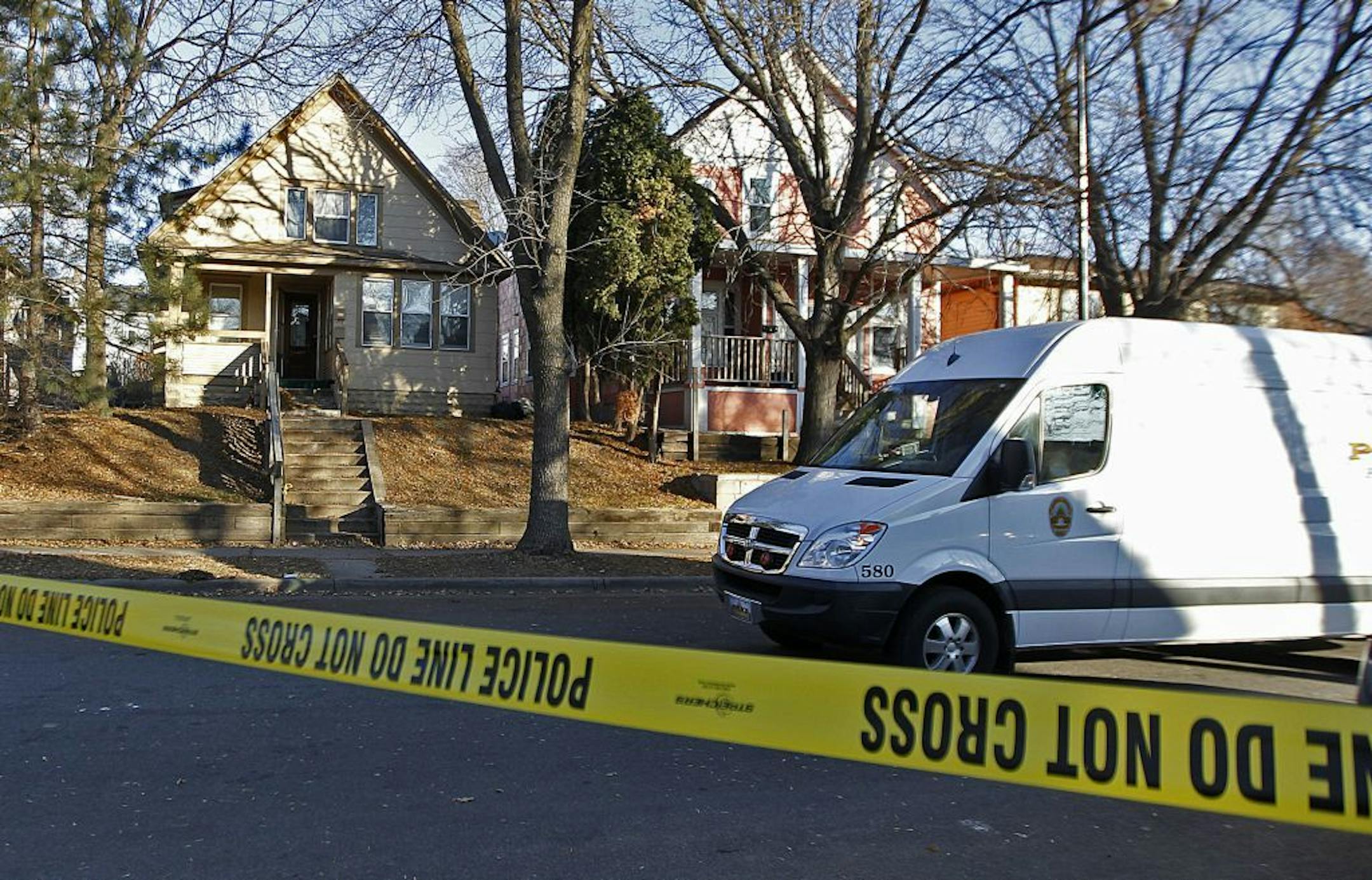 Police were investigating the scene where a man was found shot to death early Tuesday, November 26, 2013 in St. Paul's Dayton's Bluff neighborhood.