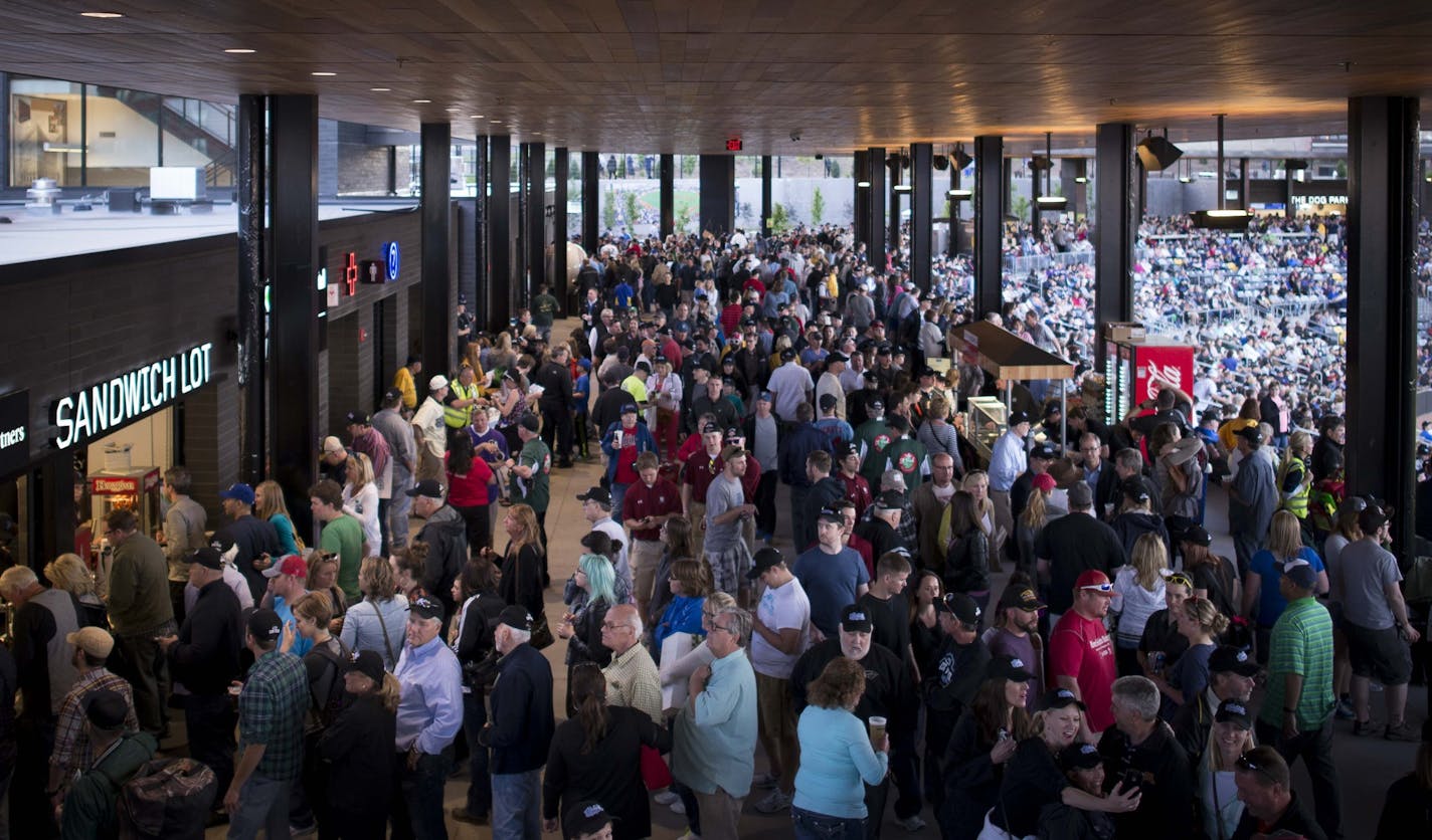 Fans packed the concourse between innings at the home opener.