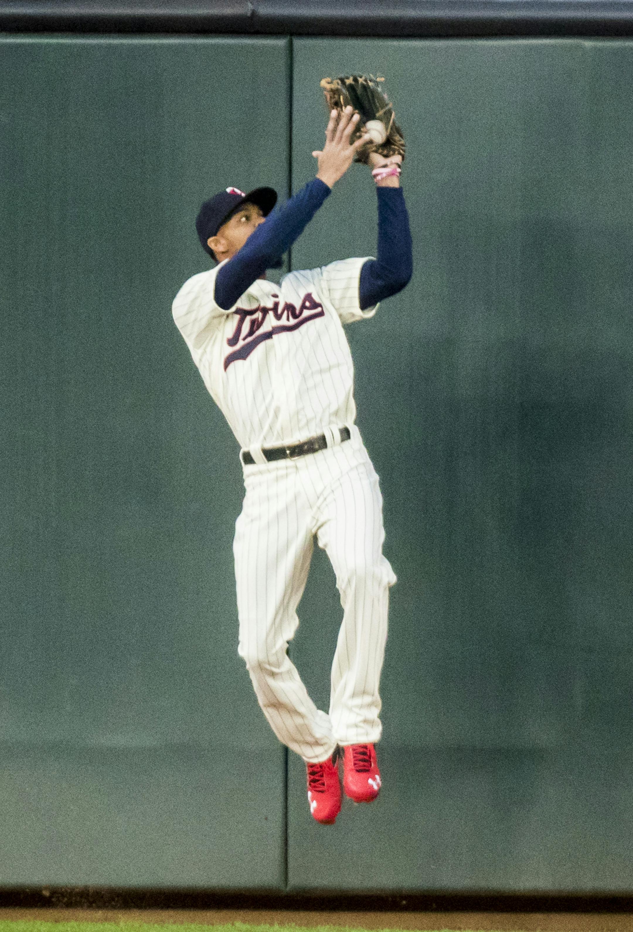 Minnesota Twins center fielder Byron Buxton (25) caught a fly ball by Oakland Athletics shortstop Chad Pinder (18) to close out the top of the second inning. ] RENEE JONES SCHNEIDER • renee.jones@startribune.com The Oakland A's verses the Minnesota Twins at Target Field in Minneapolis, Minn., on Wednesday, May 3, 2017.