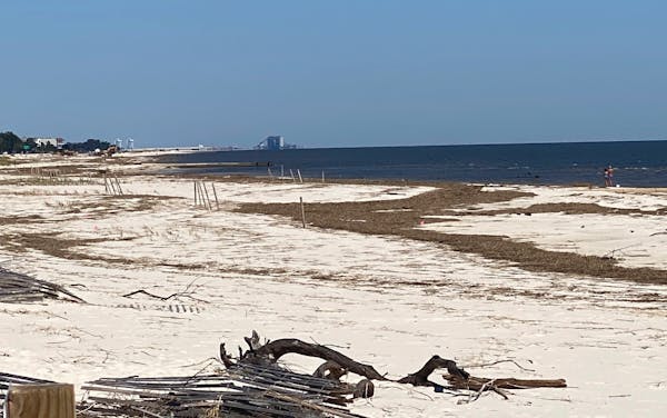 Beaches were still filled with debris and erosion from Hurricane Ida in Pass Christian, Miss., Sunday, Sept. 26, 2021. 