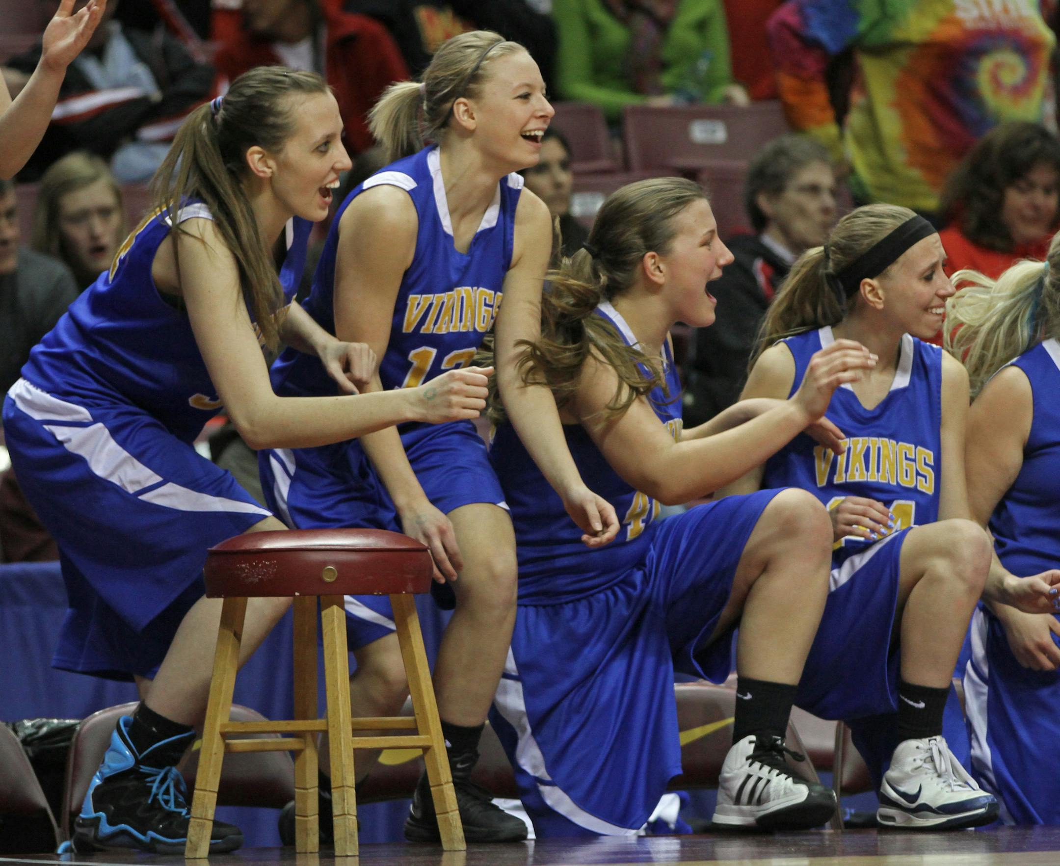 Class 1A girls' basketball state quarterfinals at Williams Arena, 3/14/13, Minneota vs. Mountain Iron-Buhl, (left to right) The Minneota reserves started the celebration as the final seconds ticked off the clock during the game against Mountain Iron-Buhl.] Bruce Bisping/Star Tribune bbisping@startribune.com