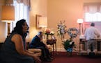 Michele Preissler at the viewing for her husband Darryl, who died of COVID-19, at a funeral home in Pasadena, Md., May 26, 2021. COVID-19 hospitalizat