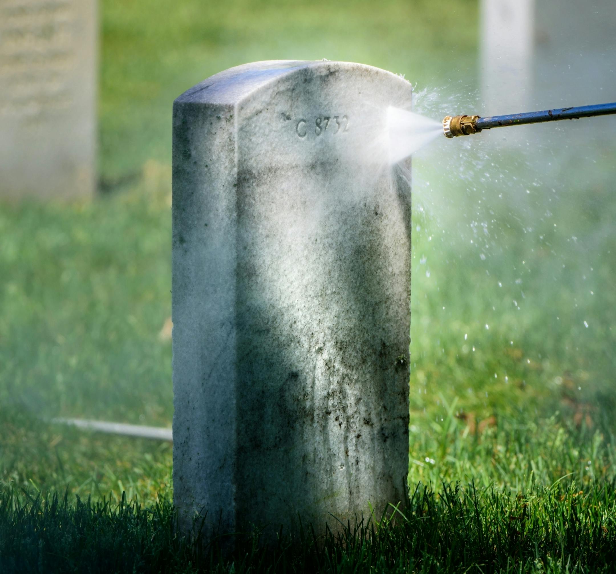 Power washing gravestones is a full time job for Mark Linafelter at Fort Snelling National Cemetery. He averages around 250 per day and around Memorial Day he focuses his attention to the ones under trees that need it the most to keep the place looking good for visitors.