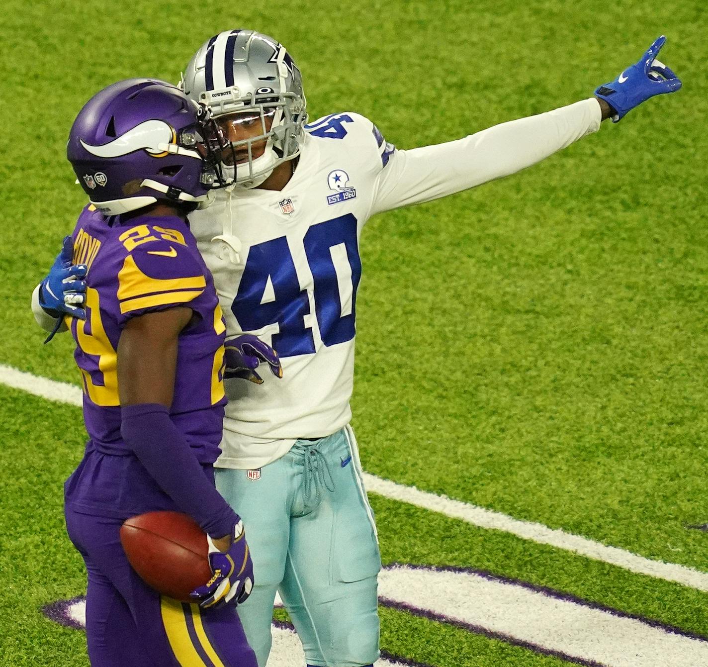 Cowboys safety Steven Parker taunted Vikings cornerback Kris Boyd after Boyd's penalty negated his fourth-down reception on a fake punt.