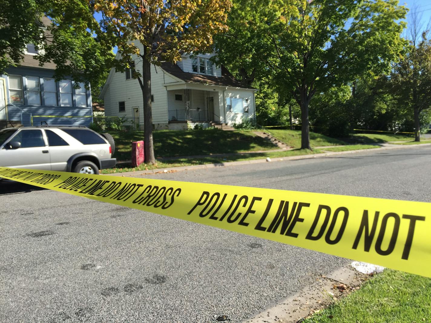 Police tape marks off the scene of a fatal shooting overnight Saturday, Sept. 12, 2015, in the 1200 block of 22nd Av. North in Minneapolis.